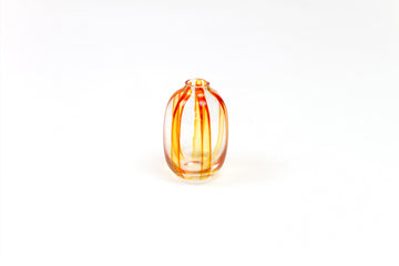 Hand-painted striped glass bud vase in tangerine orange