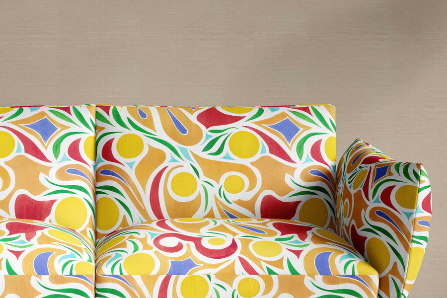 sofa upholstered in 100% European French linen Venable Moore ‘Capri’ Lemon Yellow, Red, and Ochre fabric made-to-order and printed in the U.S.A.