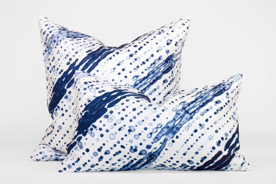 Two 100% linen glissando shibori pillows in marine blue, 20” x 20” and 12” x 20”