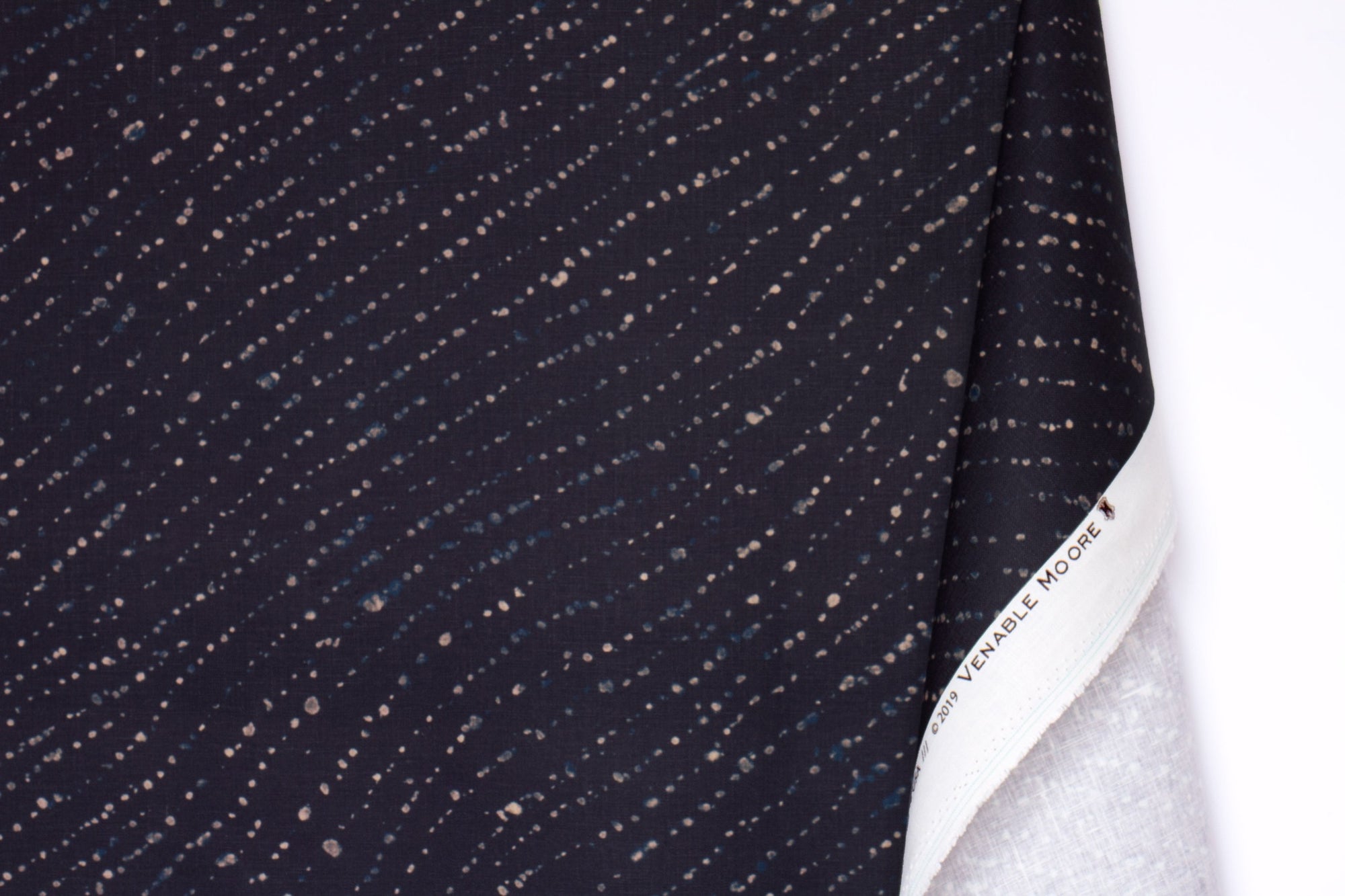 100% linen staccato decolorato shibori fabric by the yard with long fold in midnight blue