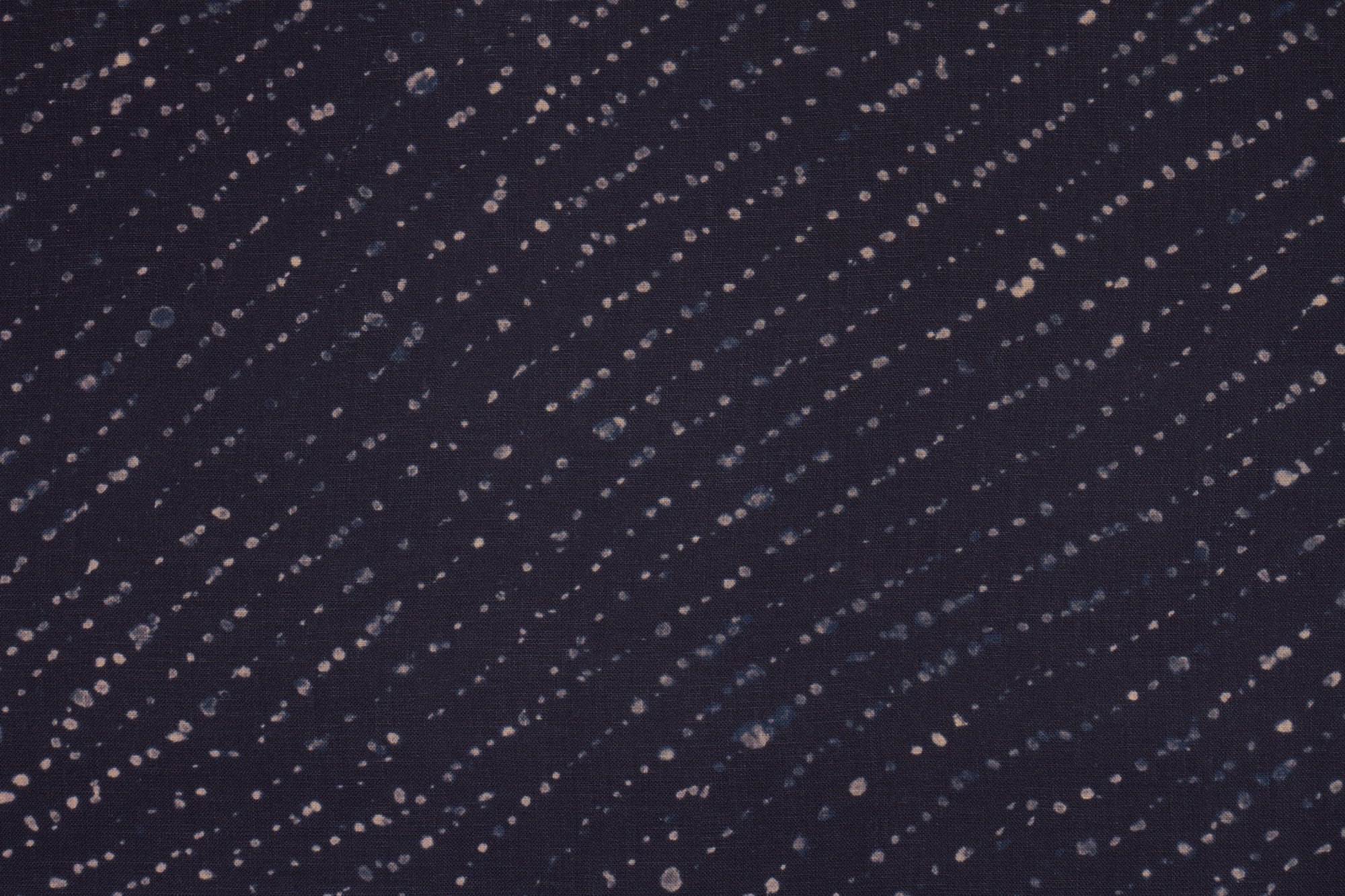 100% linen staccato decolorato shibori fabric by the yard up close in midnight blu
