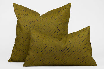 Two 100% linen staccato nero shibori pillows in moss green, 20” x 20” and 12” x 20”