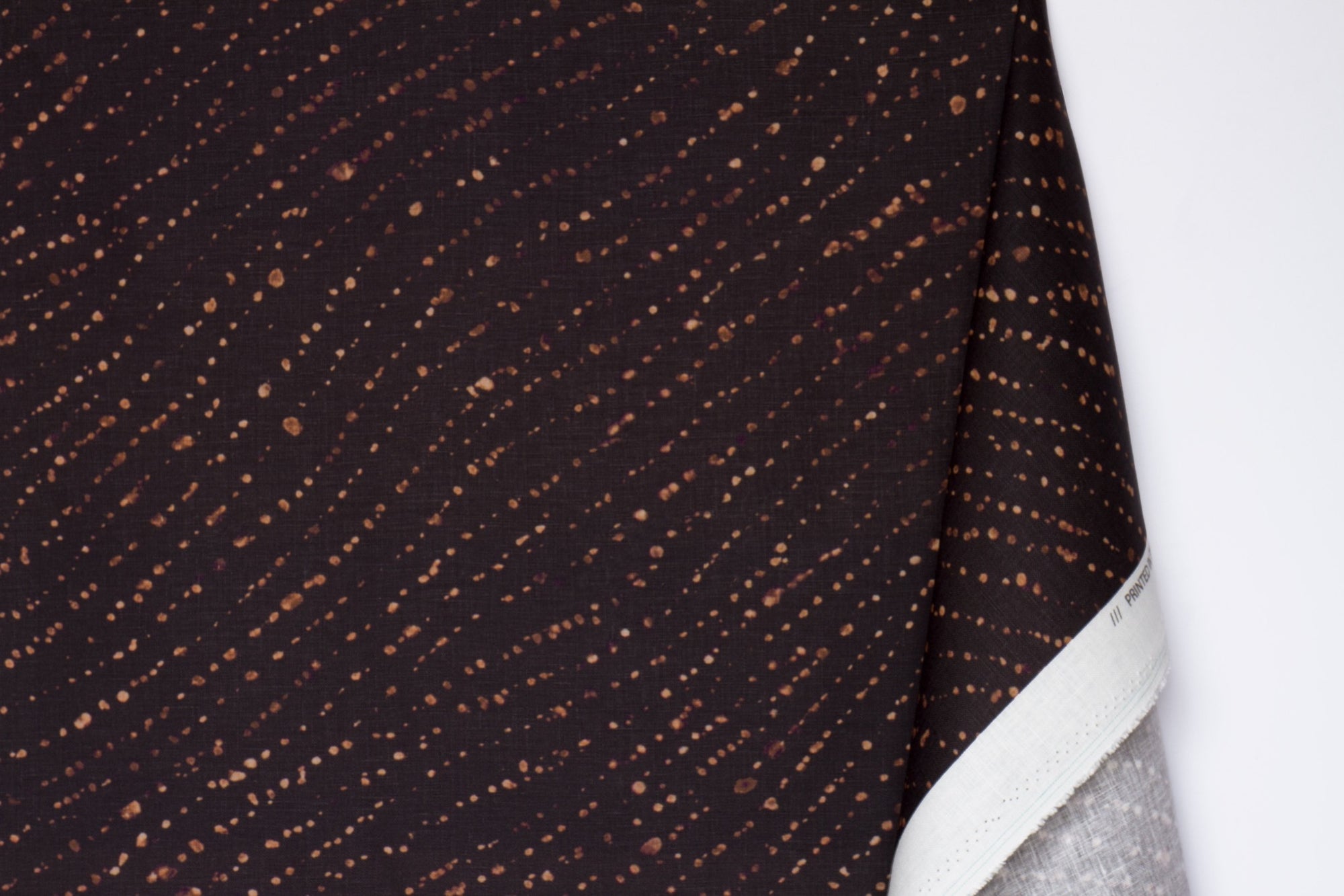 100% linen staccato decolorato shibori fabric by the yard with long fold in onyx black