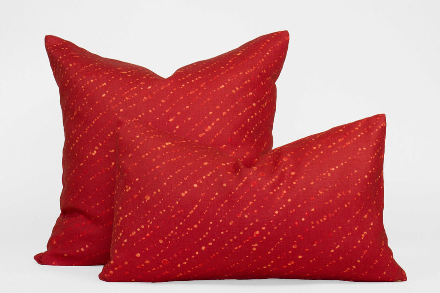 Two 100% linen staccato decolorato shibori pillows in paprika red, 20” x 20” and 12” x 20”
