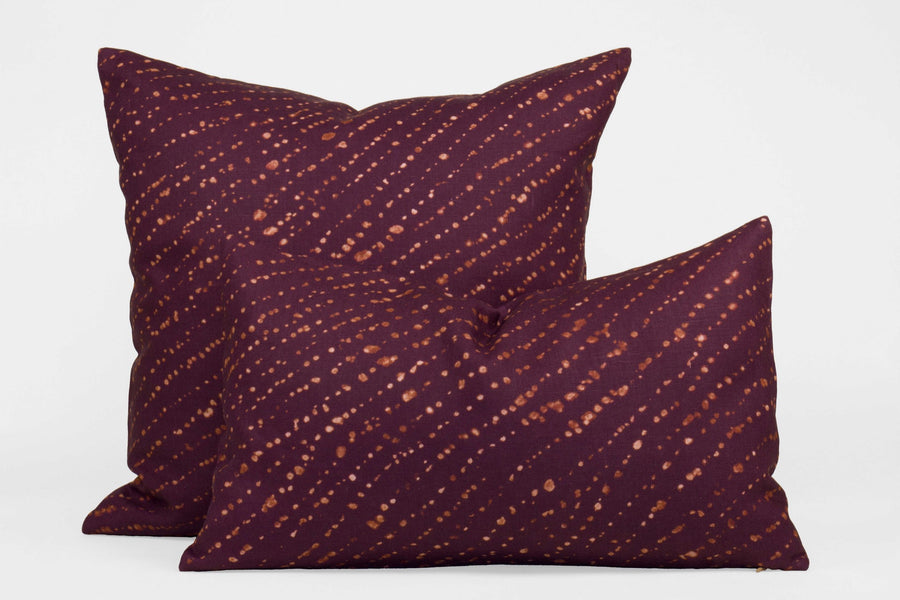 Two 100% linen staccato decolorato shibori pillows in plum purple, 20” x 20” and 12” x 20”
