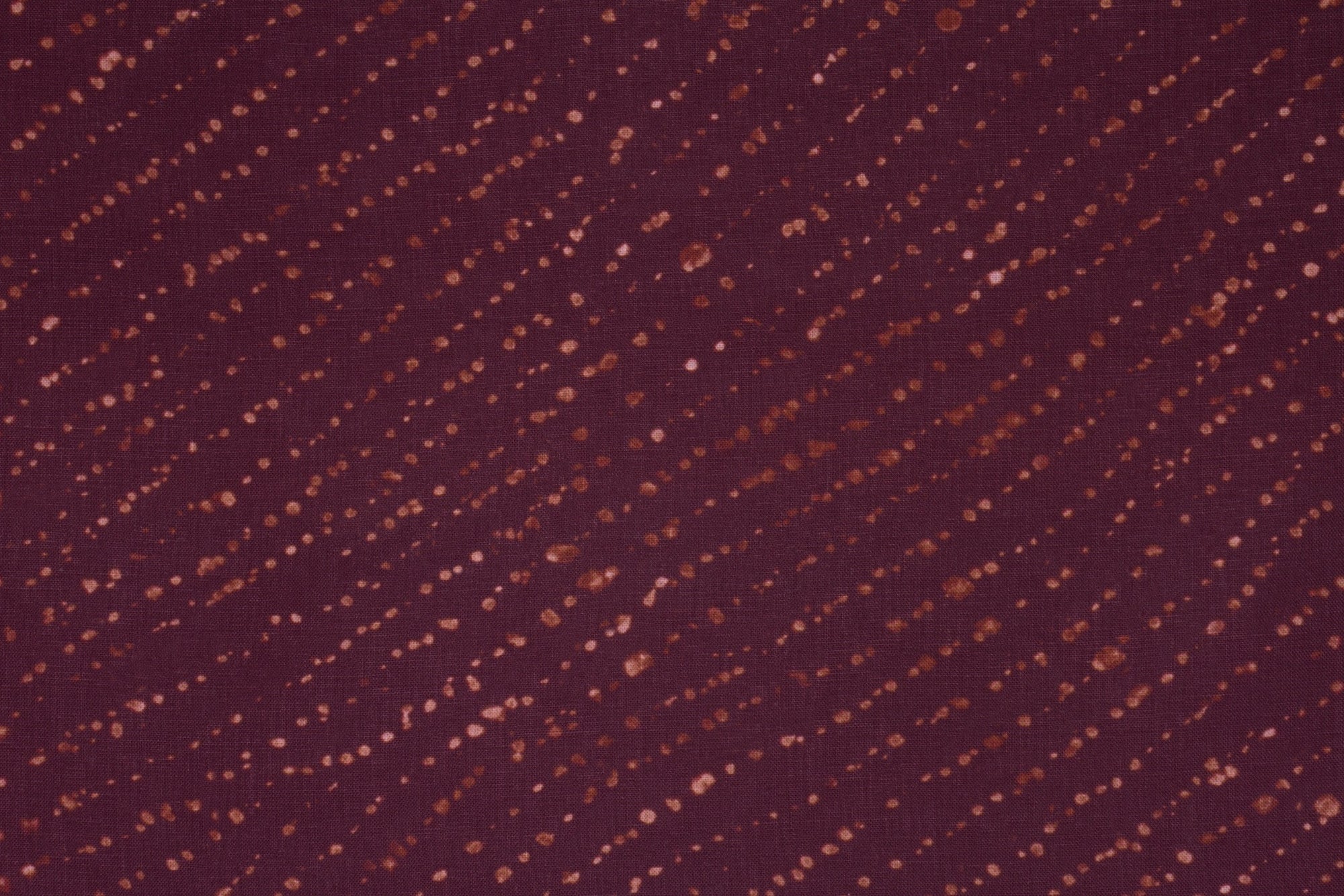 100% linen staccato decolorato shibori fabric by the yard up close in plum purple