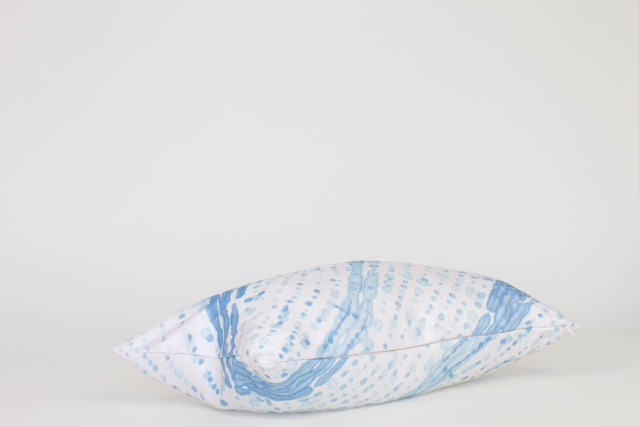 Side view 12” x 20” 100% linen glissando pillow in powder blue with hidden zipper