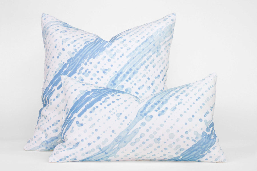 Two 100% linen glissando shibori pillows in powder blue, 20” x 20” and 12” x 20”