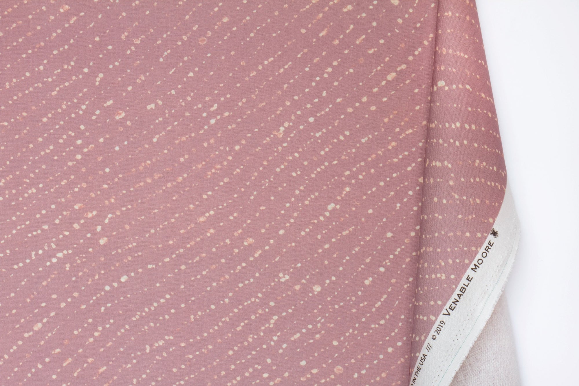 100% linen staccato decolorato shibori fabric by the yard with long fold in rose clay pink
