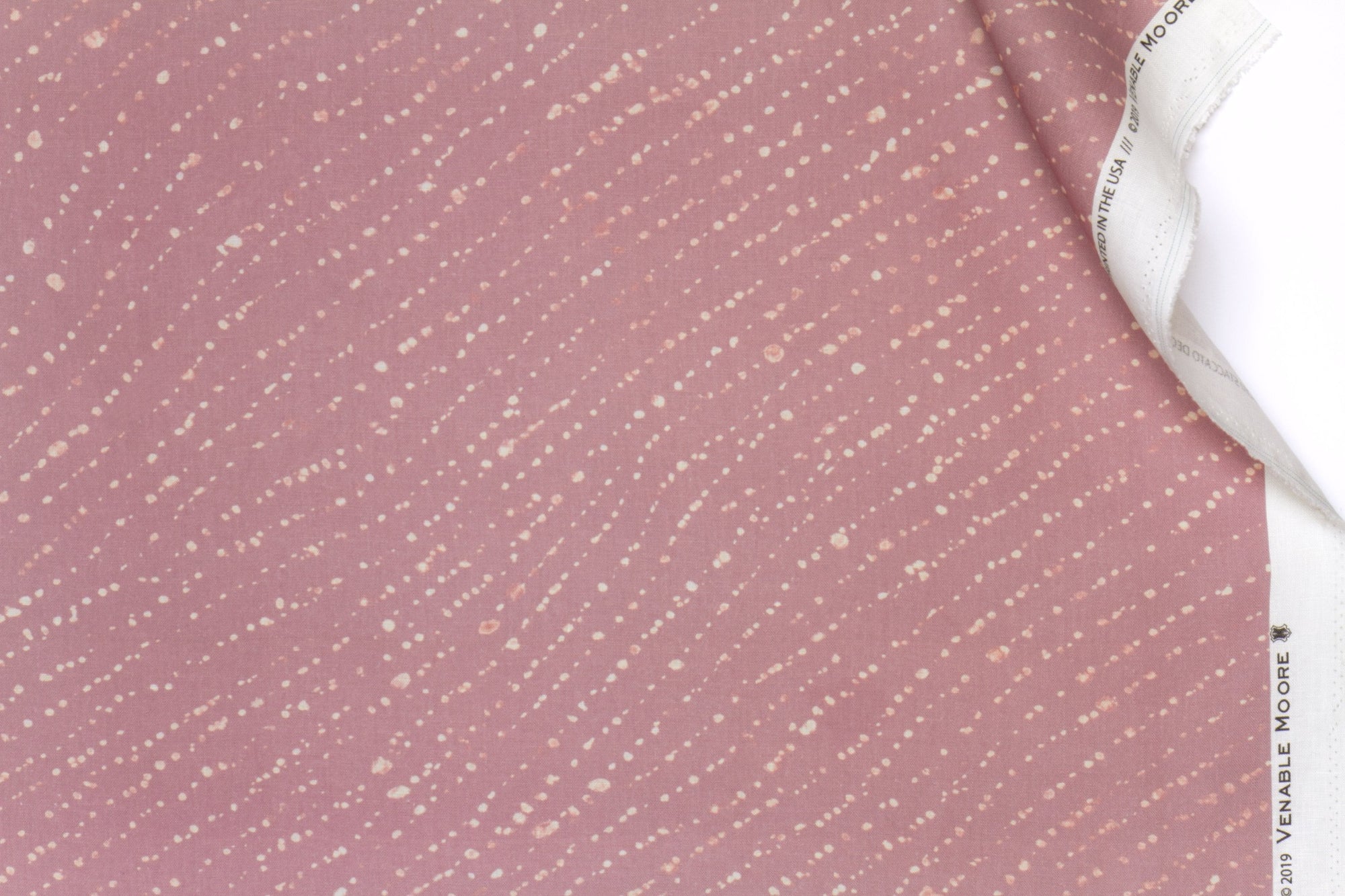 100% linen staccato decolorato shibori fabric by the yard in rose clay pink with top fold