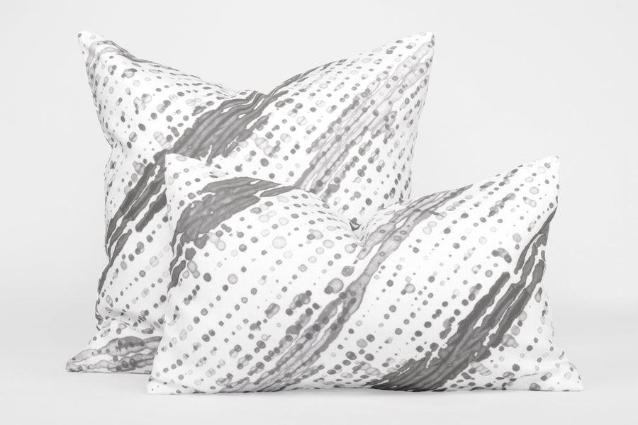 Two 100% linen glissando shibori pillows in storm grey, 20” x 20” and 12” x 20”