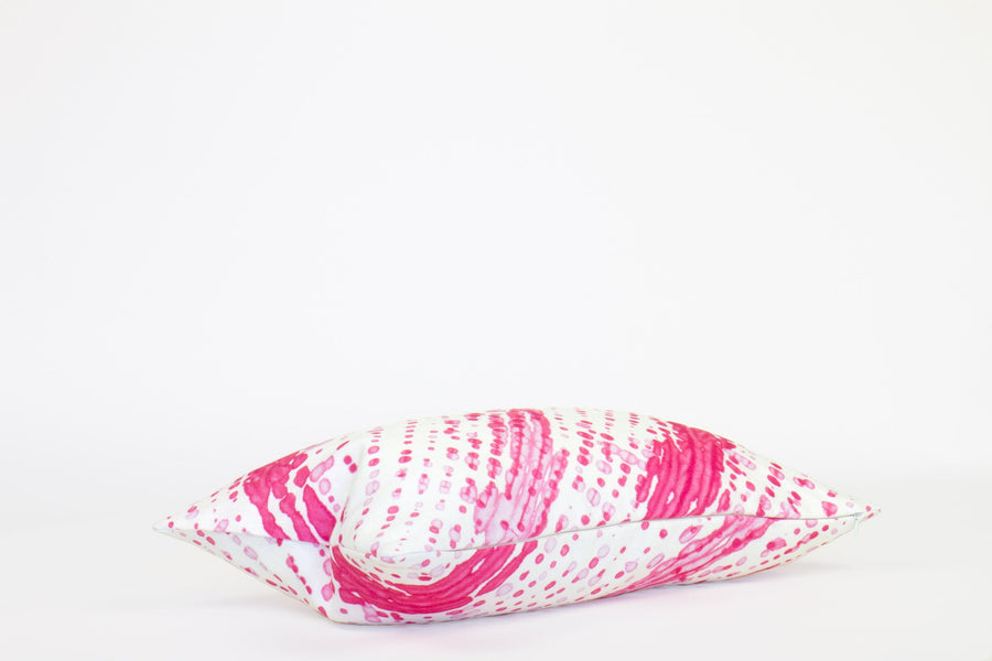 Side view 12” x 20” 100% linen glissando pillow in strawberry pink with hidden zipper