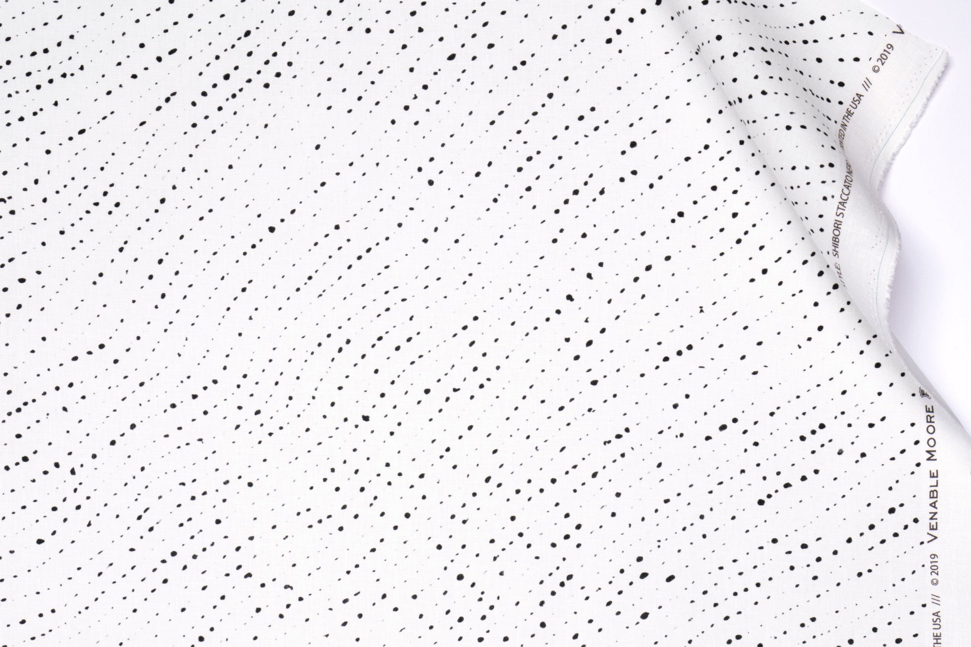 Venable Moore 100% linen staccato nero shibori fabric by the yard in alabaster white with top fold