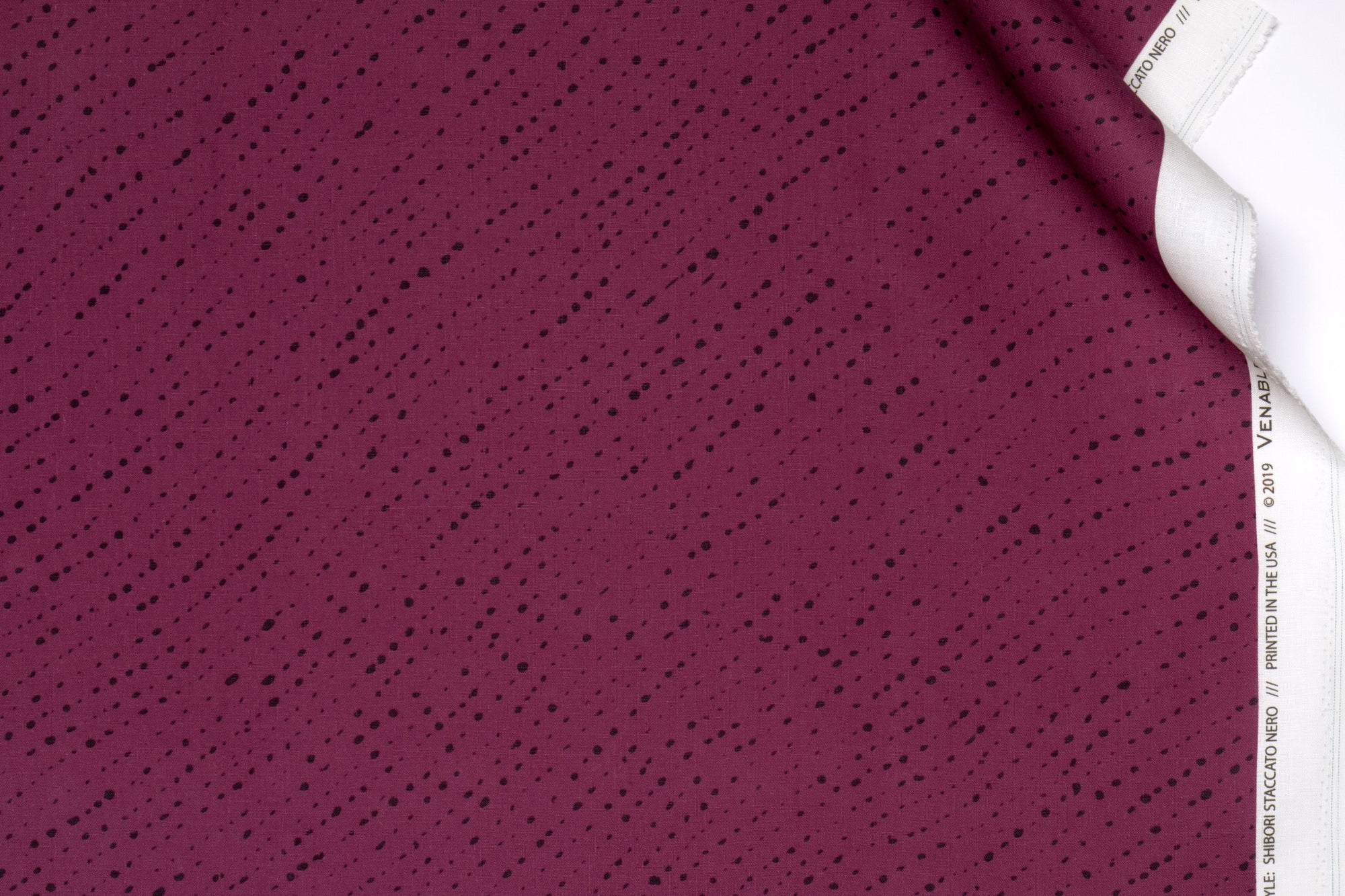 Venable Moore 100% linen staccato nero shibori fabric by the yard in cerise pink with top fold