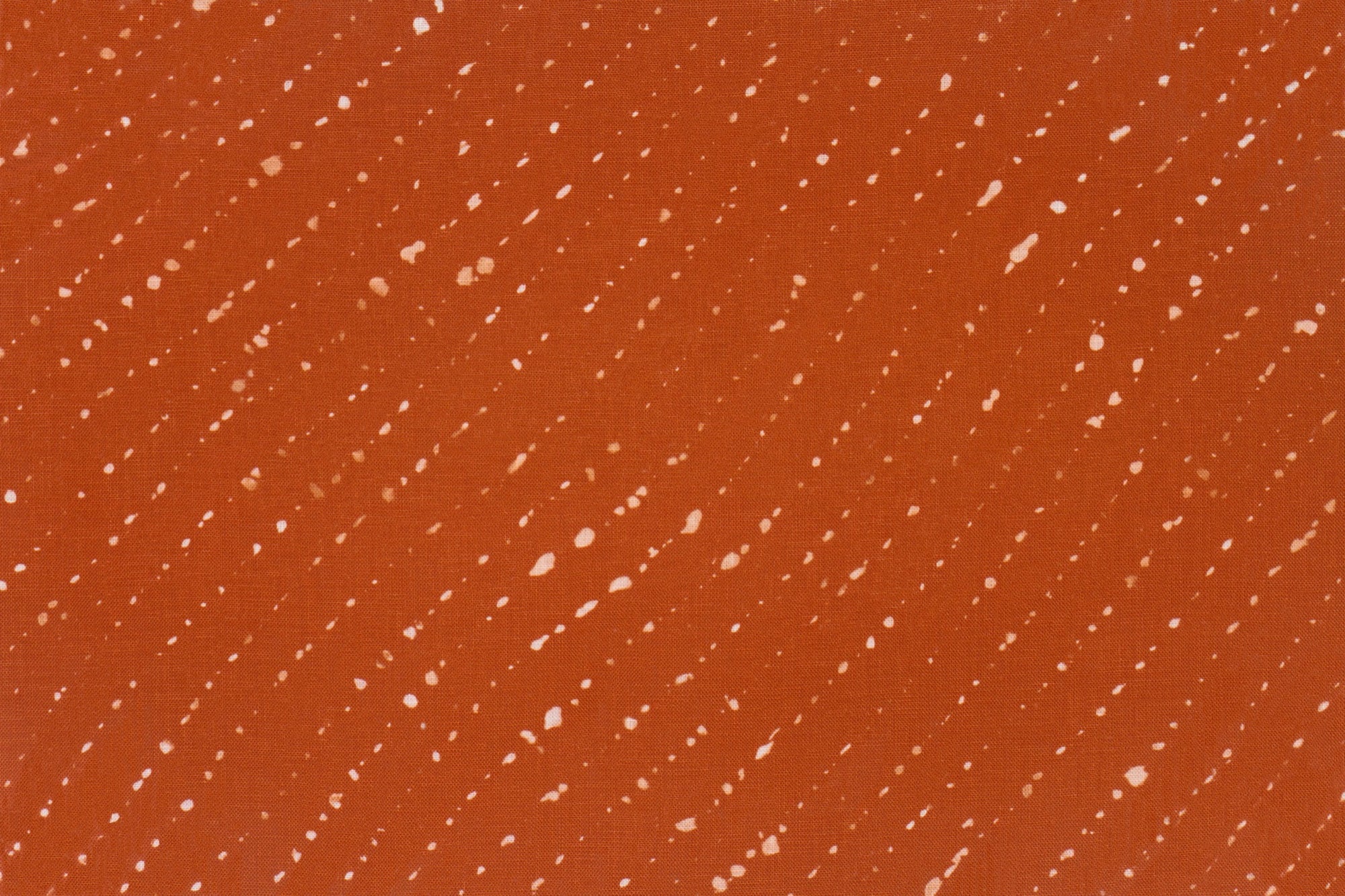 Staccato Sbiancato Shibori linen in ginger burnt orange up close