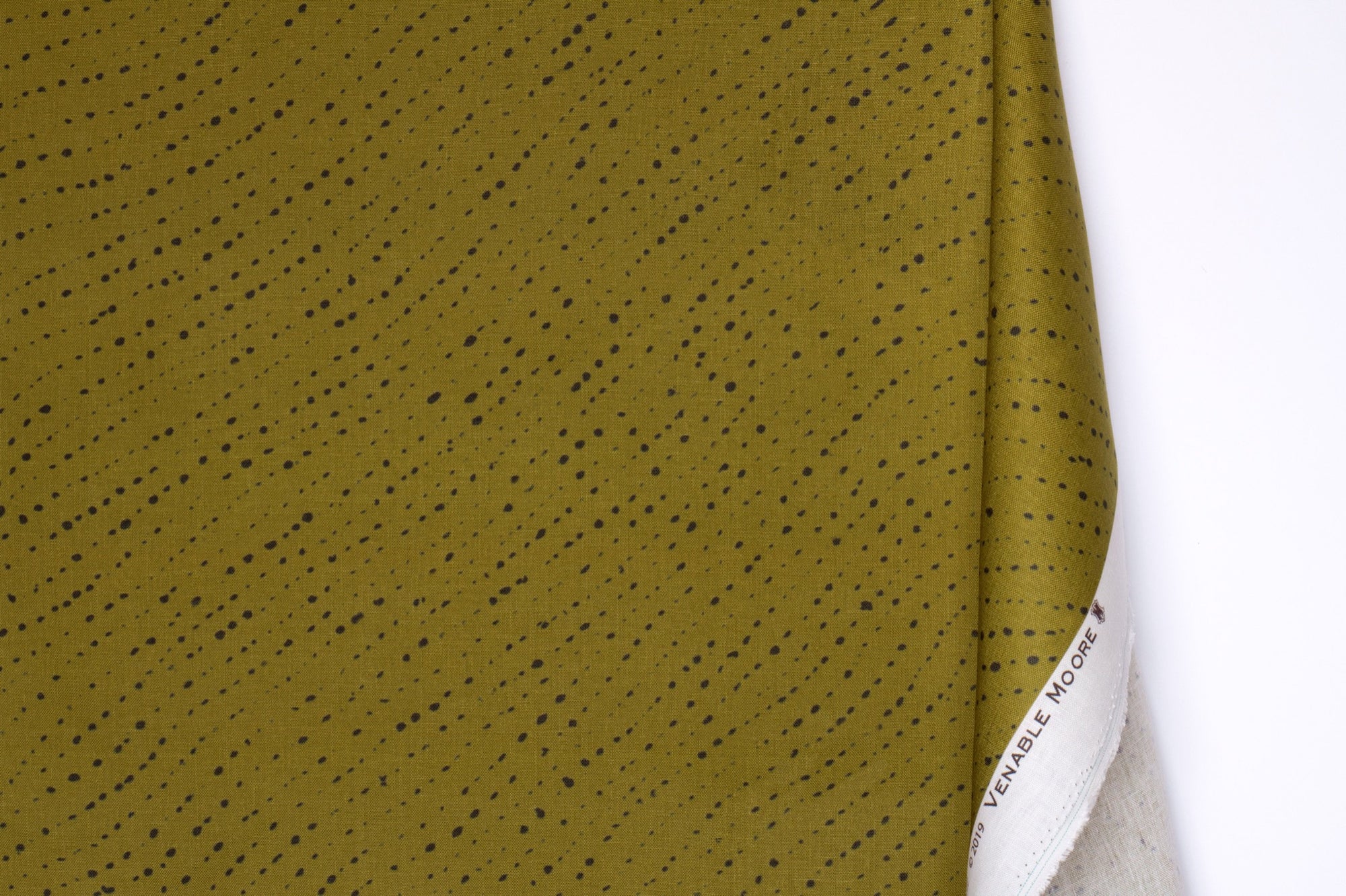 Venable Moore 100% linen staccato nero shibori fabric by the yard with long fold in moss green