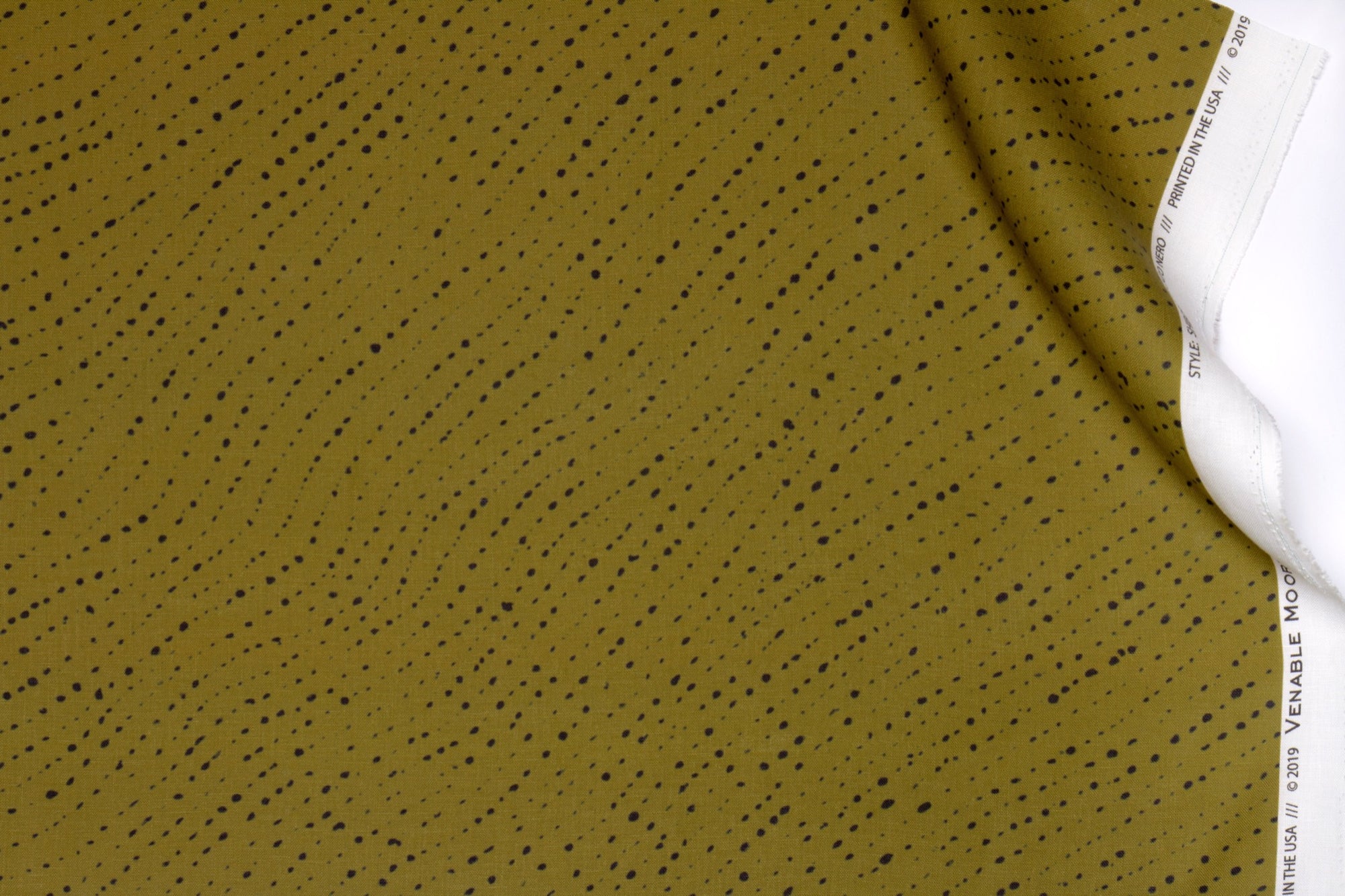 Venable Moore 100% linen staccato nero shibori fabric by the yard in moss green with top fold