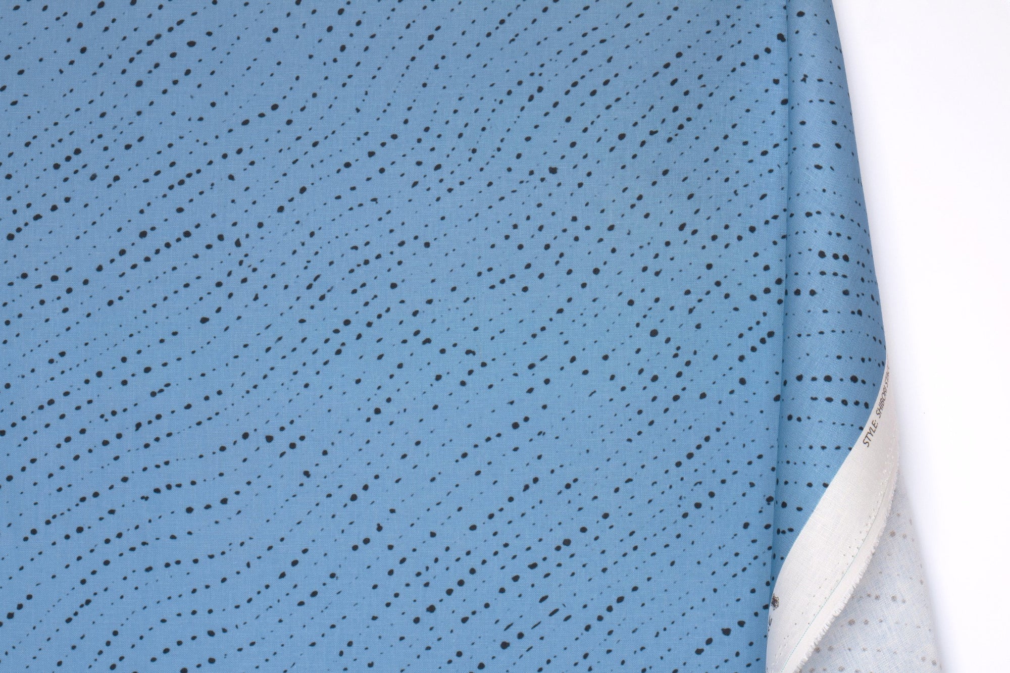 Venable Moore 100% linen staccato nero shibori fabric by the yard with long fold in sky blue